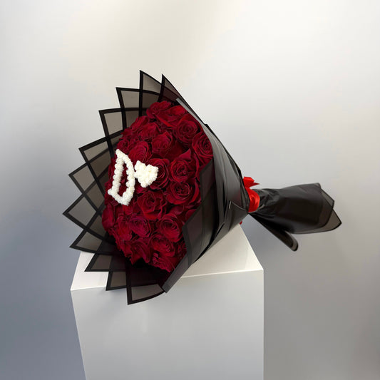 Bouquet of roses with initial letter